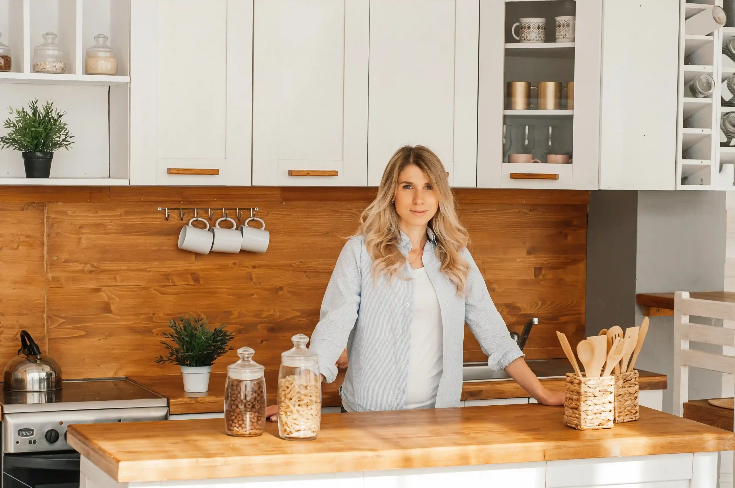 Portrait of Leena in her kitchen, creator of EasyCookingToDo, a blog for busy moms and simple recipes.
